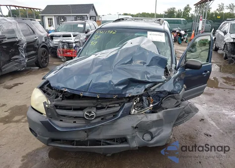 2001 Mazda Tribute Dx V6 z USA, uszkodzony, nr VIN 4F2YU06161KM60082